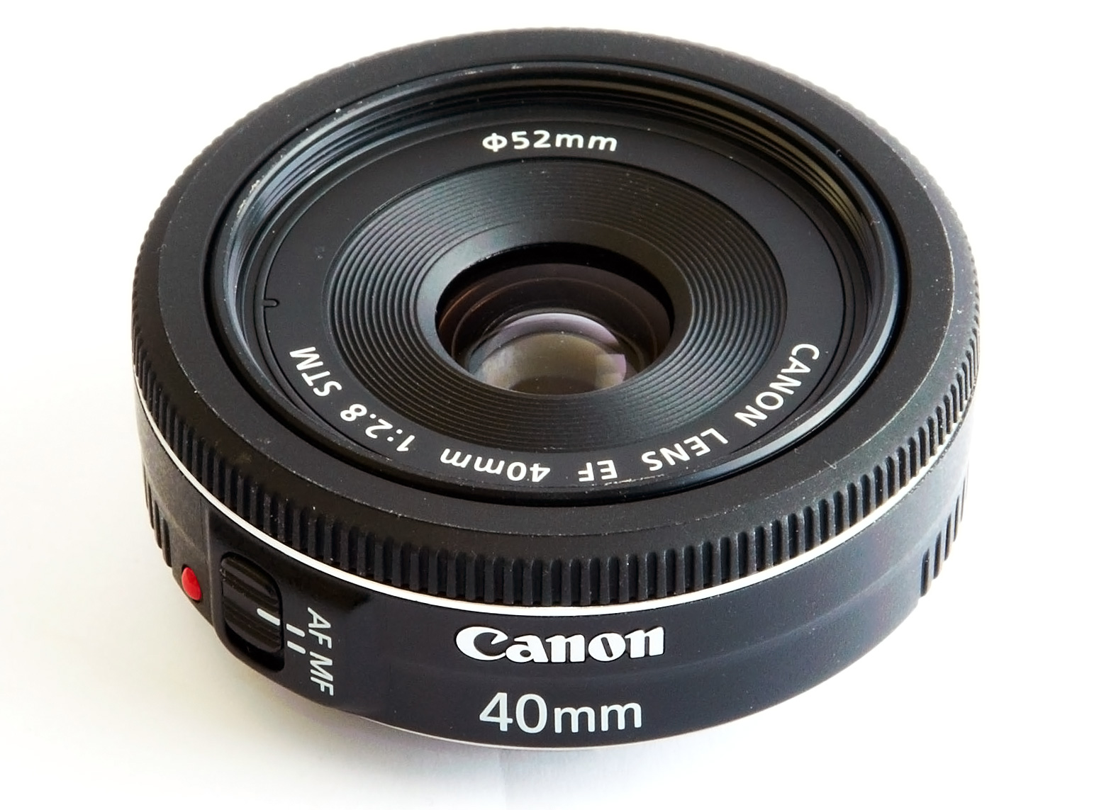 Объективы 40mm. Canon 40mm 2.8 STM. 40мм Canon f2.8 STM. Canon 40mm f/2.8. Canon EF 40mm Lens.