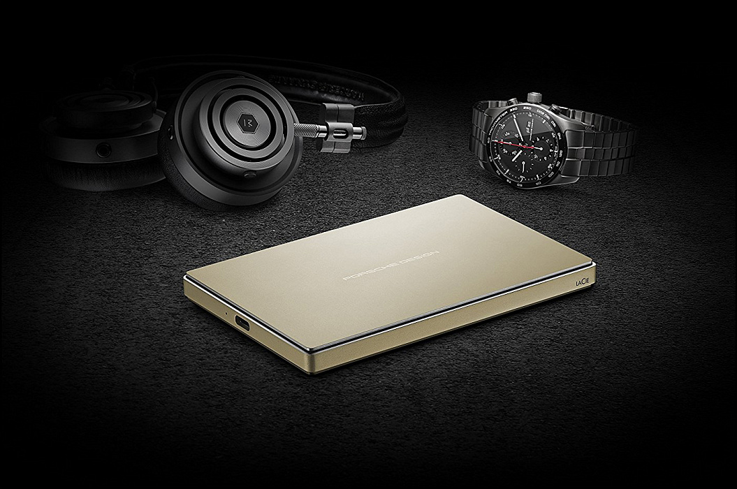 Внешний накопитель LaCie Porsche Design Mobile 2Tb USB 3.1 STFD2000403 (Gold) купить в интернет-магазине icover